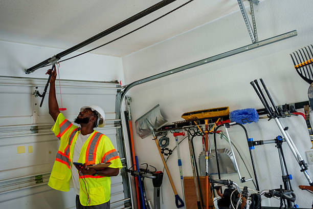 Professional Garage Door Installation technician working in Milwaukie, OR